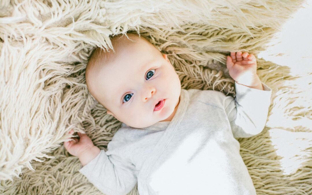 An infant baby with a tilted neck torticollis