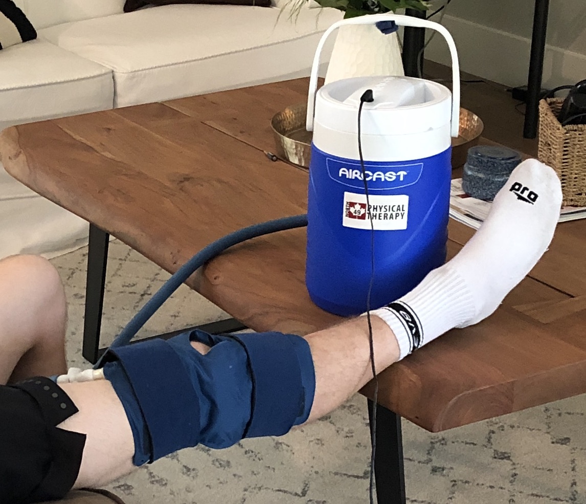 Cryocuff machine strapped to knee